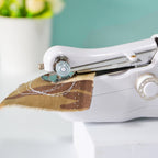 Aarenza Mini Electric Sewing Machine, lightweight and portable, with a sleek design and visible control buttons on a white background.