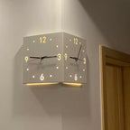 Arenzza 3D double-sided wall clock with automatic induction, corner design, and modern electronic style.
