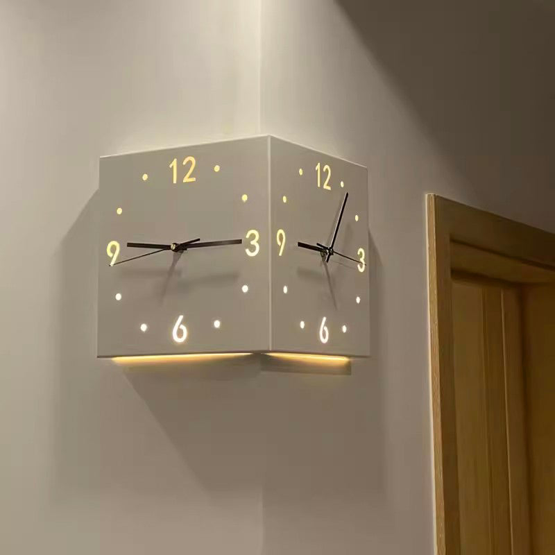 Arenzza 3D double-sided wall clock with automatic induction, corner design, and modern electronic style.