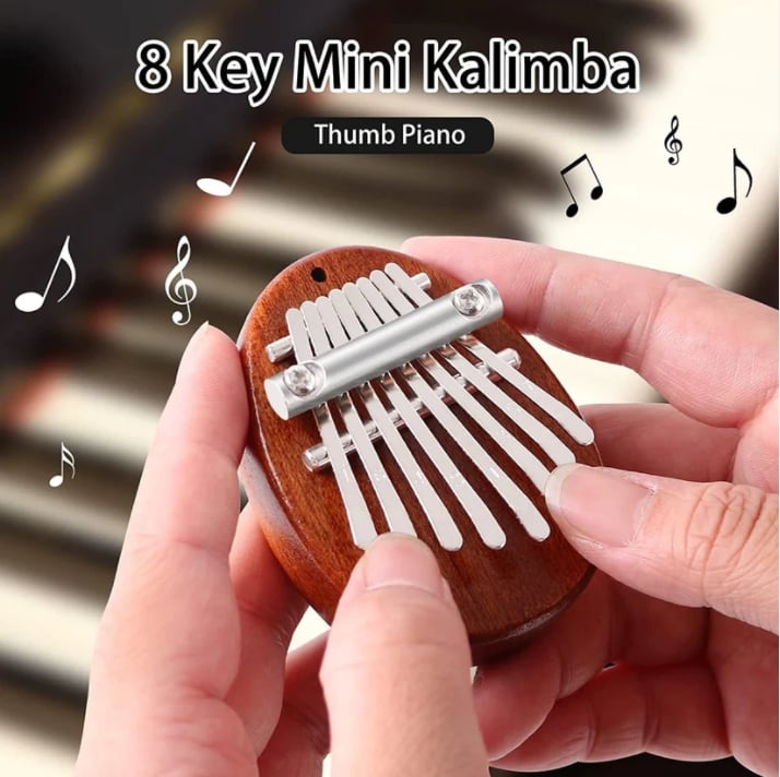 Arenzza Palm Finger Piano toy, small portable music instrument for children, featuring colorful keys and compact design for fun music play.