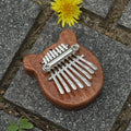 Arenzza Palm Finger Piano toy, compact musical instrument for kids, featuring colorful keys and a fun, portable design.
