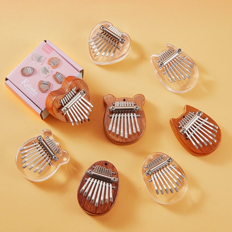 Arenzza Palm Finger Piano toy with colorful keys, designed for kids to enjoy music anywhere, part of Gifts & Toys collection.