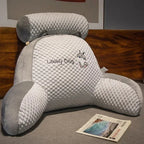 Aarenza BackWell ergonomic reading pillow with supportive memory foam and adjustable straps for comfortable upright sitting.
