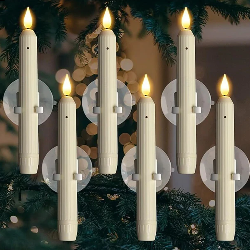 Arenzza LED taper candles with sensor and suction cups, ideal for Halloween and Christmas decorations, glowing softly in dark.