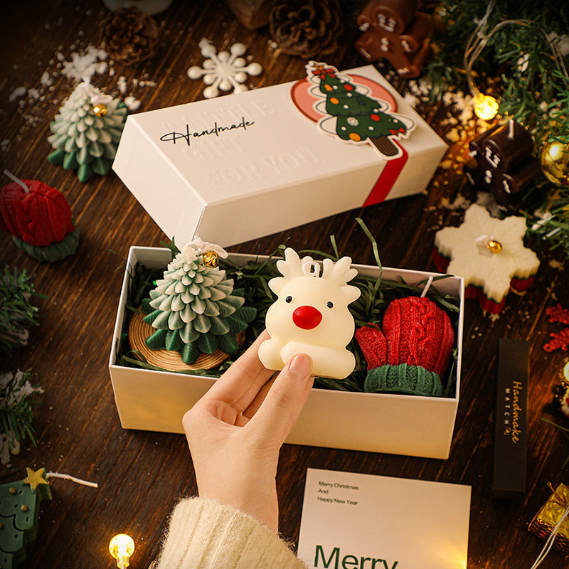 Aarenza Christmas scented candle gift set with festive holiday candles in decorative containers and seasonal packaging.