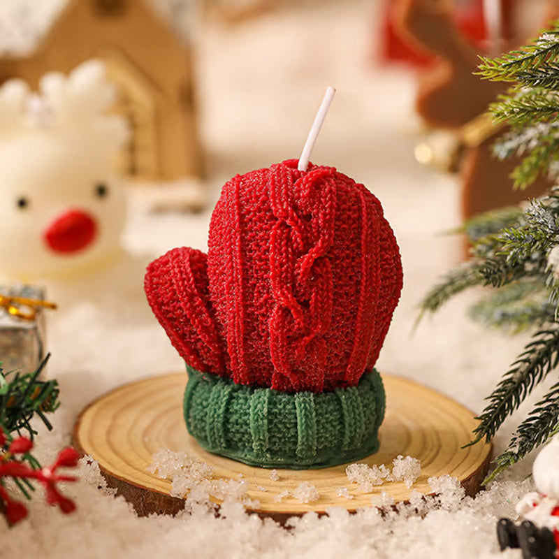 A Christmas scented candle gift set by Arenzza featuring festive candles in decorative containers for holiday ambiance.