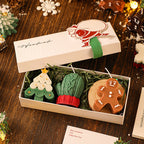 A Christmas scented candle gift set from Arenzza, featuring festive candles in decorative containers for holiday ambiance.