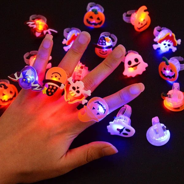 A set of 50 Arenzza LED glowing rings for Halloween and Christmas, featuring bright, colorful light-up rings with festive designs.