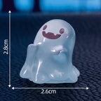 Cute glow-in-the-dark mini ghost figurines for Halloween and Christmas by Arenzza, featuring adorable ghost characters in the image.