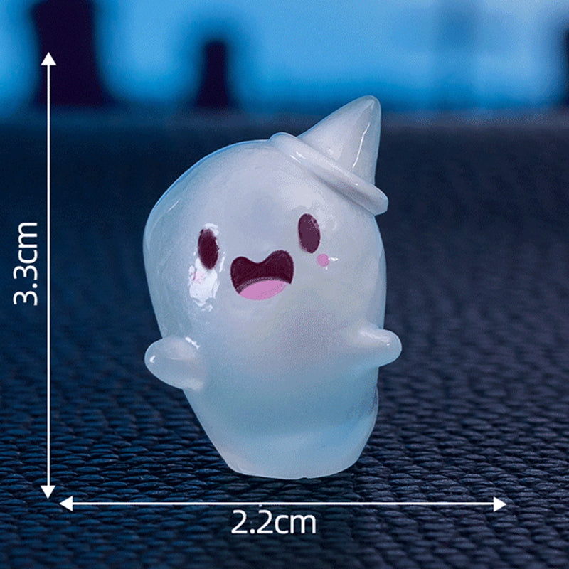 Cute glow-in-the-dark mini ghost figurines for Halloween and Christmas by Arenzza, shown in a festive display.