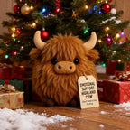 Aarenza Highland Cow plush toy with festive holiday decorations, soft and cuddly for Christmas and emotional support.