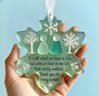 Handcrafted snowflake-shaped sea glass friendship ornament by Arenzza, perfect for Halloween and Christmas decor.