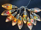 Arenzza Christmas string lights with LED bulbs, perfect for holiday decor, featuring festive holiday-themed lighting on a string.