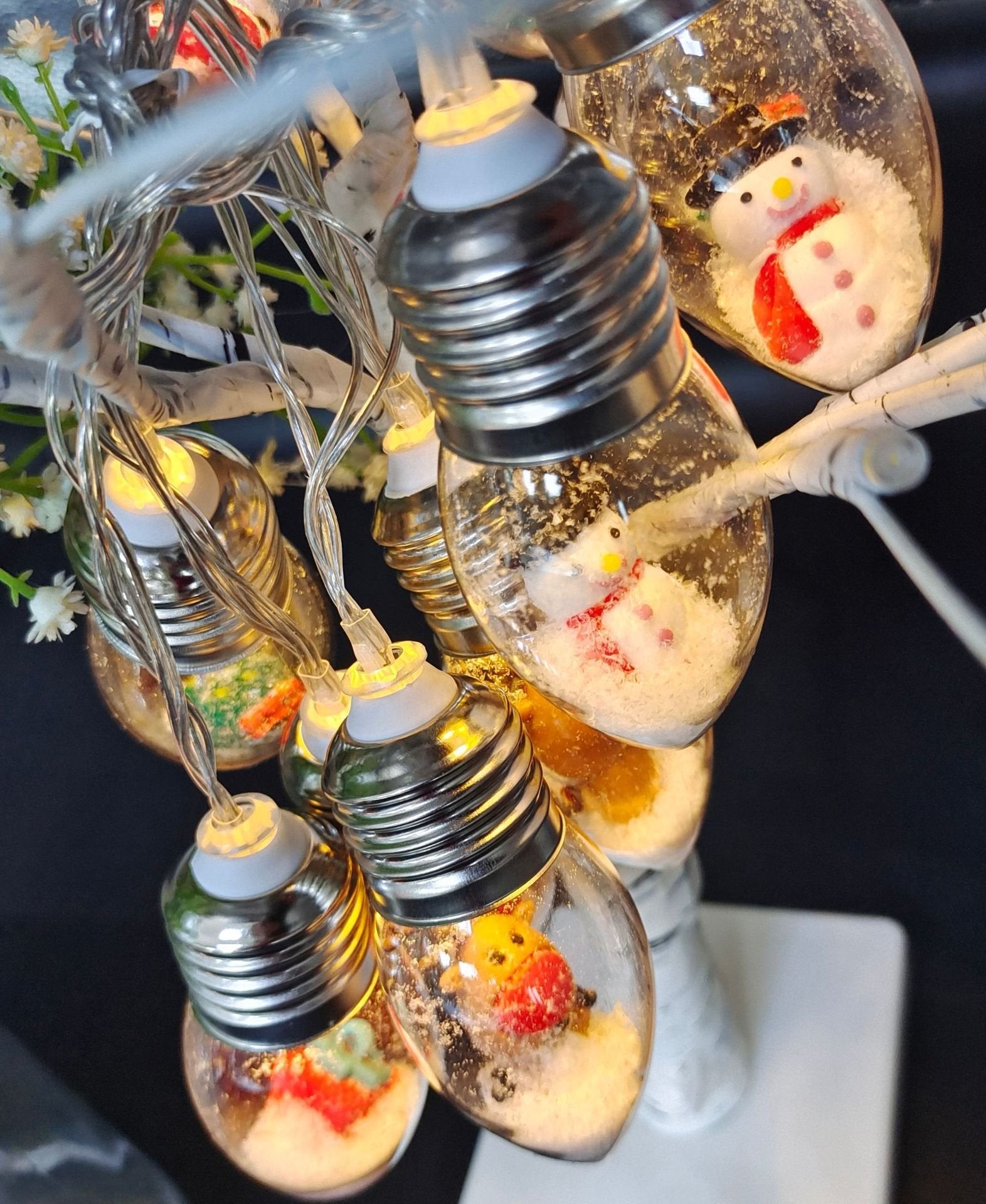 Arenzza Christmas string lights with LED bulbs, festive holiday decoration for Christmas and Halloween celebrations.