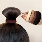 A black durable wide elastic hair tie from Arenzza, suitable for securing thick or long hair in a health and beauty setting.