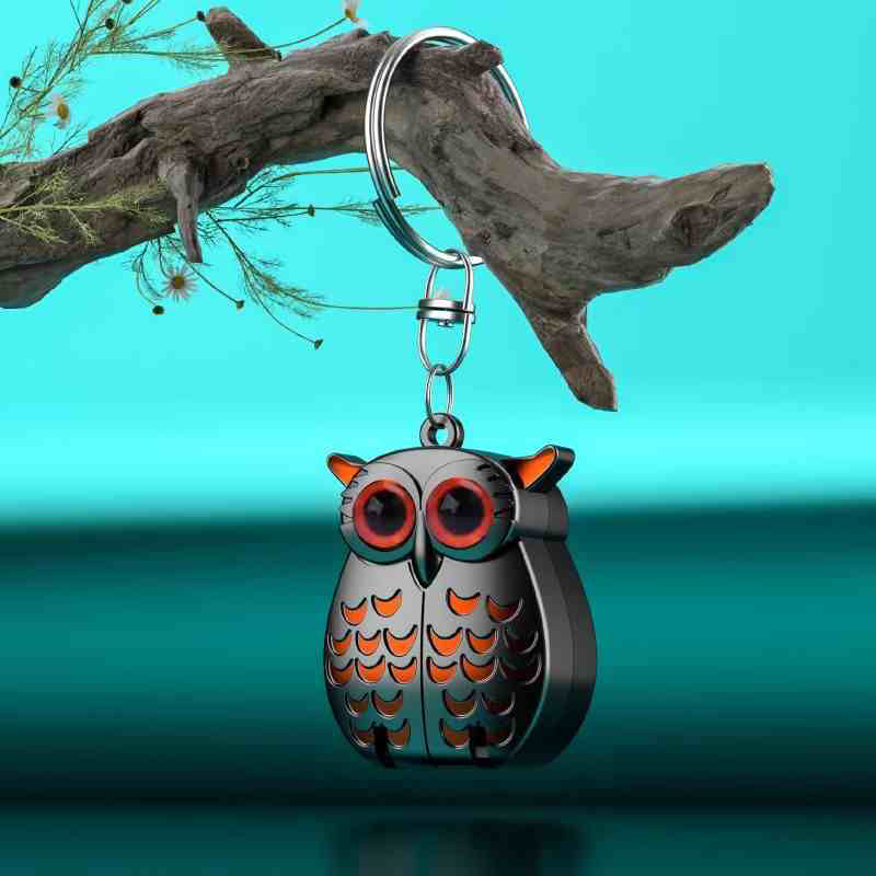 Mini foldable stainless steel owl clipper from Arenzza, compact health and beauty tool with detailed owl design.
