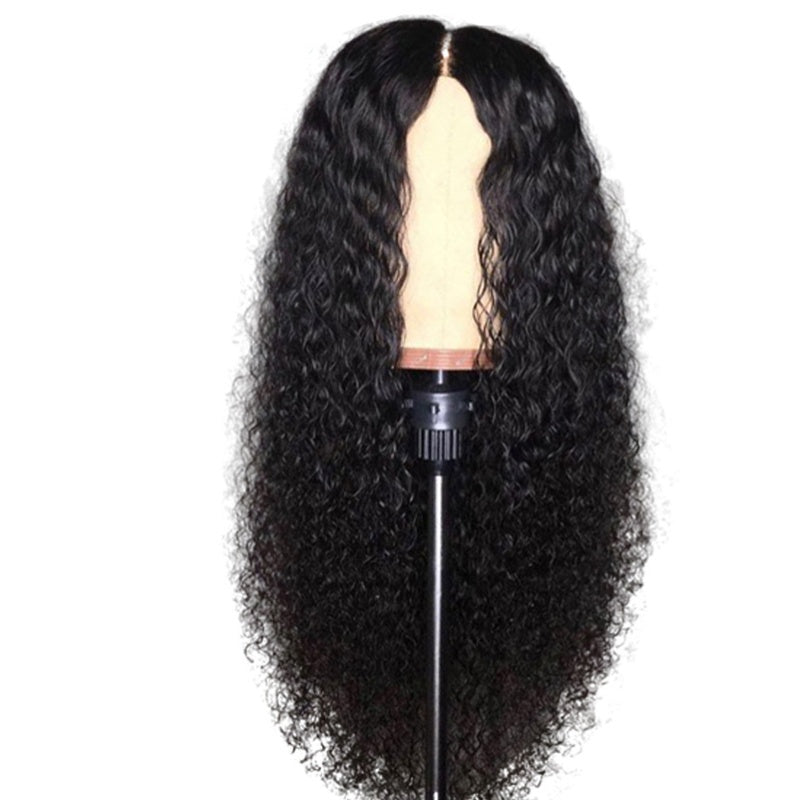 A woman wearing a long, curly Arenzza women's wig with voluminous, textured hair for a natural, stylish look.