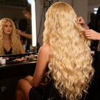 Long curly women's wig by Arenzza with voluminous, natural-looking curls, styled for a fashionable health and beauty look.