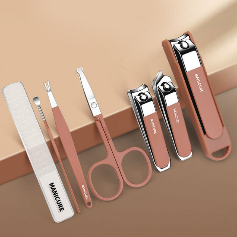 Arenzza portable 7-piece nail clipper manicure set with stainless steel clippers, scissors, and tools arranged in a compact case.