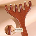 Arenzza Six-claw Meridian Massage Comb with six teeth for scalp massage, shown in a close-up view highlighting its design and texture.