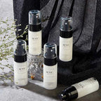 Arenzza mattifying waterproof makeup setting spray bottle, with a sleek design, intended for long-lasting, oil-control makeup hold.
