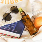 Arenzza hydrating self-tanning mist bottle with spray nozzle, designed for a natural glow in health and beauty skincare.