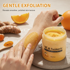 Arenzza turmeric and vitamin C exfoliating body scrub in a clear jar with a white lid, showcasing the scrub's golden color and texture.