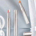 Aarenza Waterproof Gradient Shimmer Eye-Shadow Stick with a sleek silver tube, showcasing iridescent purple and pink shades.