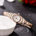 Aarenza women's rhinestone bracelet watch with a sleek silver band and sparkling rhinestones on the face, elegant and stylish accessory.