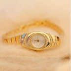Arenzza women’s rhinestone bracelet watch with a silver-tone band and sparkling rhinestone details, stylish and elegant for women.