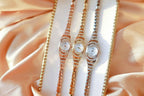 Aarenza women's rhinestone bracelet watch with a silver-tone band and a sparkling, decorative watch face, perfect for elegant style.
