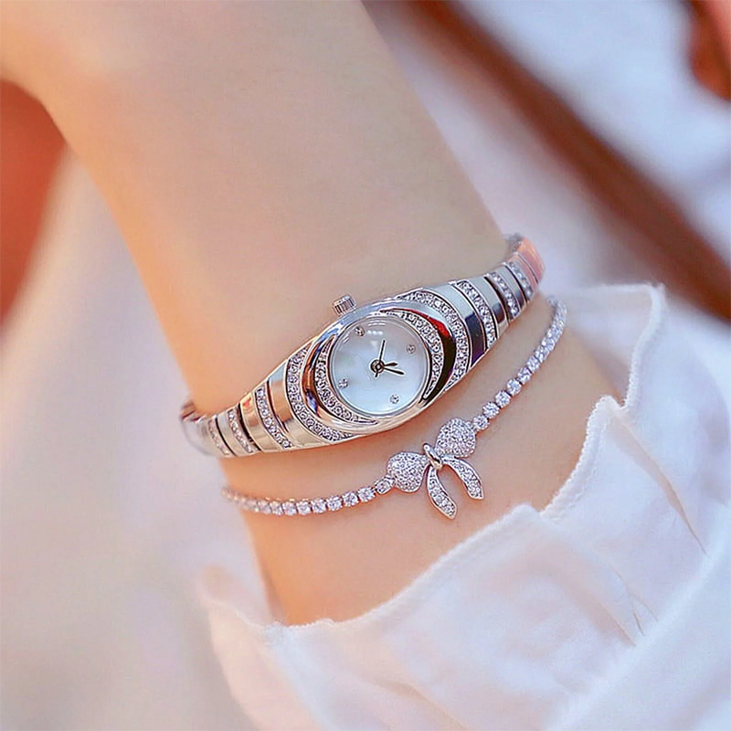 Aarenzza women's rhinestone bracelet watch with a sleek silver band and sparkling rhinestones, elegant and stylish for health and beauty.