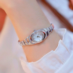 Aarenza women's rhinestone bracelet watch with a sleek silver band and a sparkling rhinestone-encrusted face, stylish and elegant.