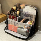 Arenzza large capacity Oxford cloth makeup bag with multiple compartments, standing upright with zipper closure for health and beauty essentials.