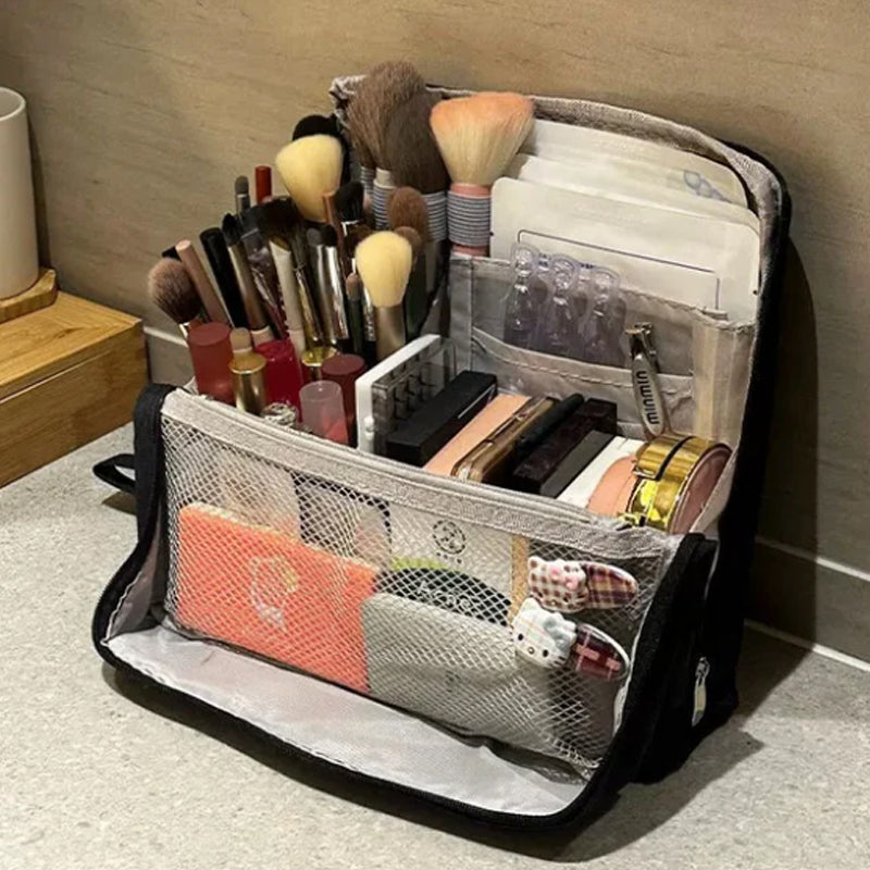 Arenzza large capacity Oxford cloth makeup bag with multiple compartments, standing upright with zipper closure for health and beauty essentials.