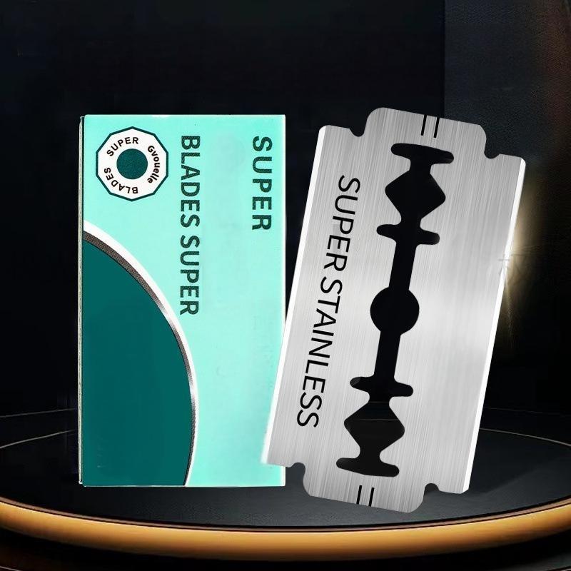 A close-up of stainless steel double-edged razor blades by Arenzza, showcasing sharp edges and polished metal surface.