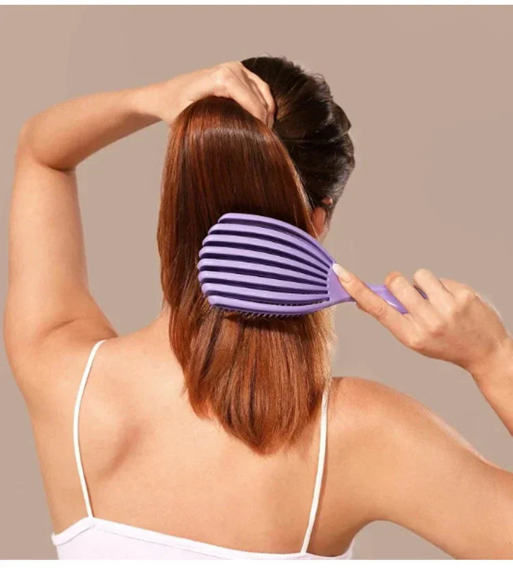 Arenzza hollow out smooth hair fluffy comb with rounded teeth, designed for gentle detangling and adding volume to hair.