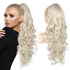 Aarenza clip-on wavy ponytail extension in vibrant purple, showcasing its wavy texture and easy clip-on design.