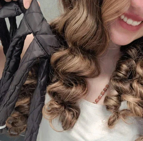 Arenzza heat-free curling hairband for sleep-in hair styling, shown on a model's head with curly hair.