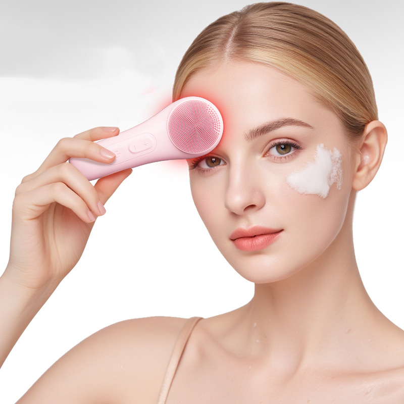 Arenzza electric face scrubber with heat and vibration, featuring a sleek handheld device for facial cleansing and skincare.