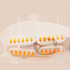 Arenzza 3-speed cordless hand massager with heat and compression, showing the compact device designed for relaxing hand therapy.