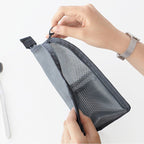 Aarenza portable lightweight travel toiletry bag in black with multiple compartments for toiletries and personal care essentials.