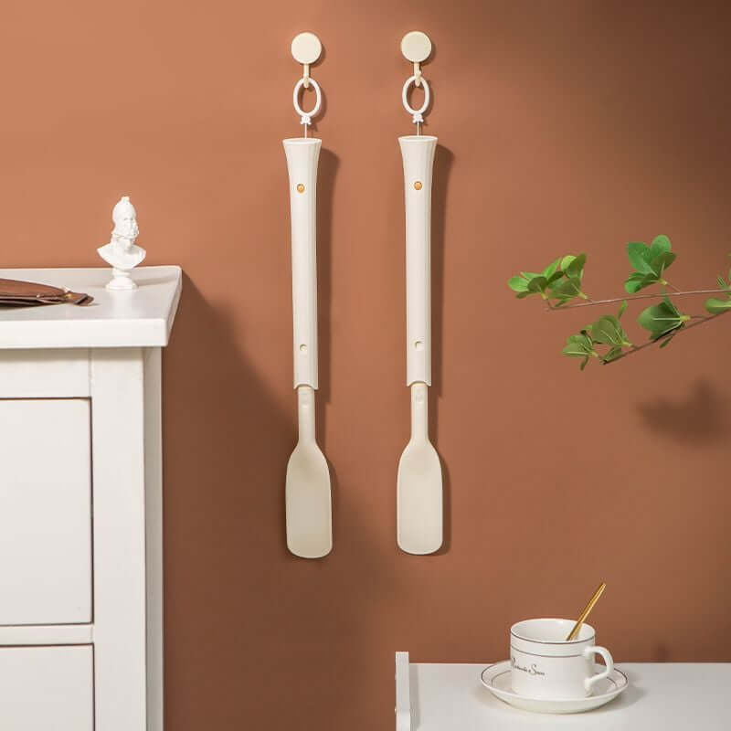 Arenzza telescopic adjustable shoe horn with extendable handle, made of durable material, ideal for convenient shoe dressing.