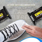 A pair of shiny shoes being cleaned with Arenzza wet wipes for a flawless, elegant look.