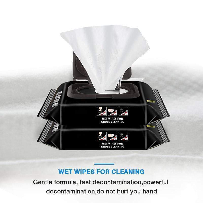 A pair of shiny shoes with a wet wipe from Arenzza for quick cleaning and maintaining a flawless, elegant look.