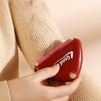 Arenzza portable reusable sticky lint roller with a black handle and sticky sheets for home lint removal.