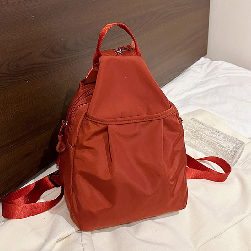 Arenzza lightweight sling bag backpack in black, featuring a sleek design with adjustable strap and multiple compartments.