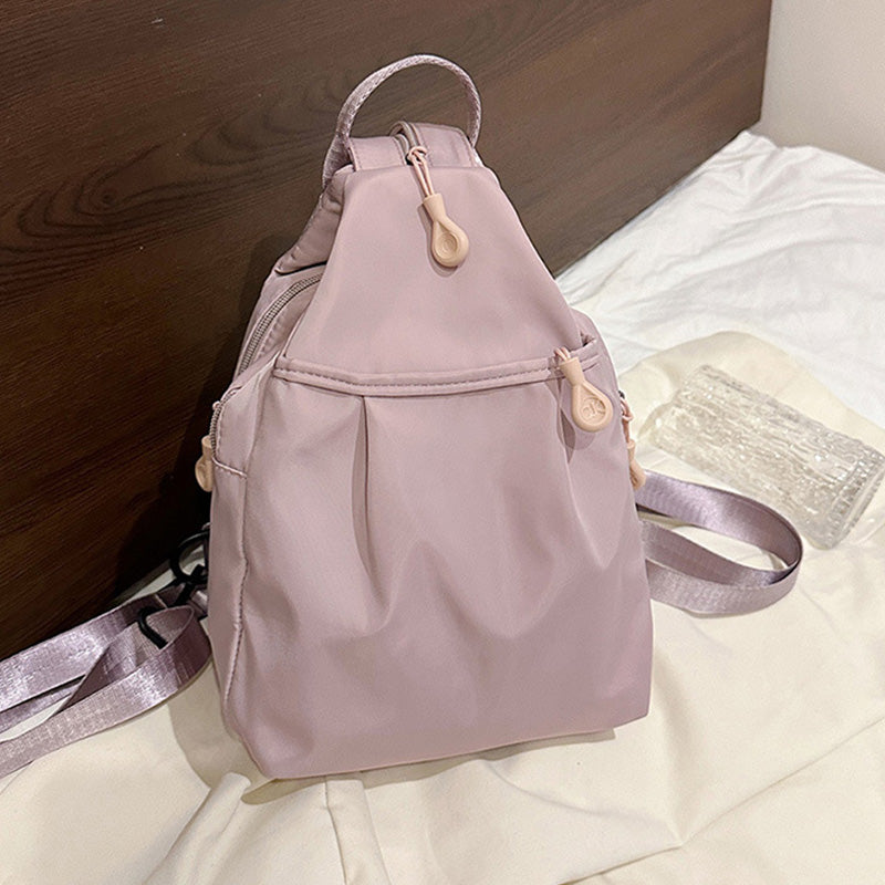 Arenzza lightweight sling bag backpack with adjustable strap and multiple compartments, ideal for everyday use and travel.