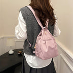 Lightweight Arenzza sling bag backpack with adjustable strap and multiple compartments, ideal for casual everyday use.