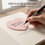 Transparent pearlescent heart-shaped sticky notes by Arenzza, hot selling, showing their shiny, heart design on a clean surface.